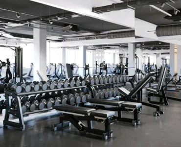 Spotless gym floor and equipment area after professional post-construction cleaning service.