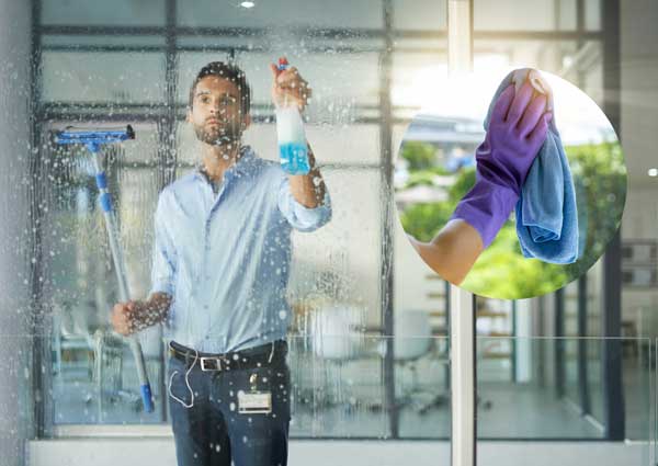 cleaning windows in office