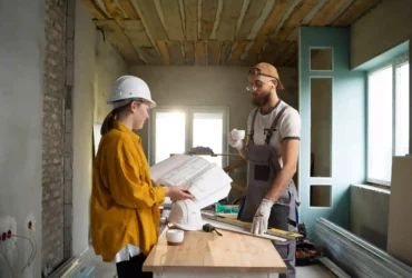 two workers working on renovation of apartment